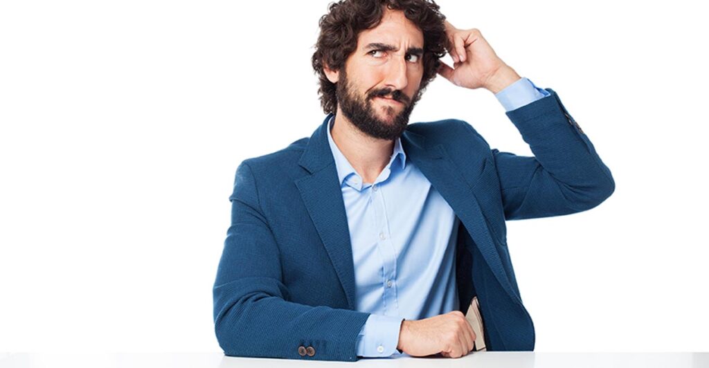 quanto costa un sito web? Uomo imprenditore perplesso